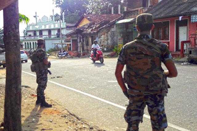 Two Army Corporals arrested over Kandy violence
