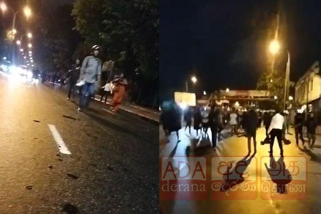 Police fire tear gas at protestors in Maradana