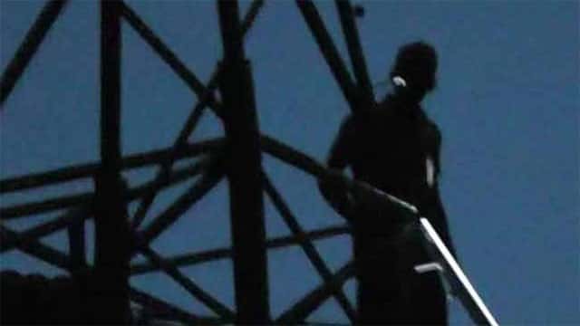 Man ordered to pay CEB losses after climbing high-voltage power pole to protest