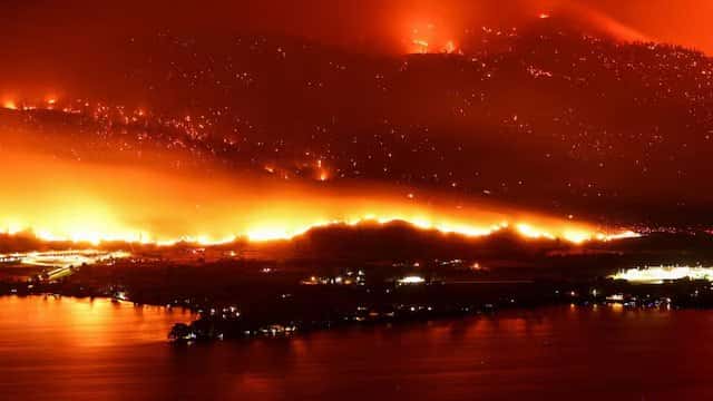 State of emergency declared as fast-moving Canada wildfire doubles in size