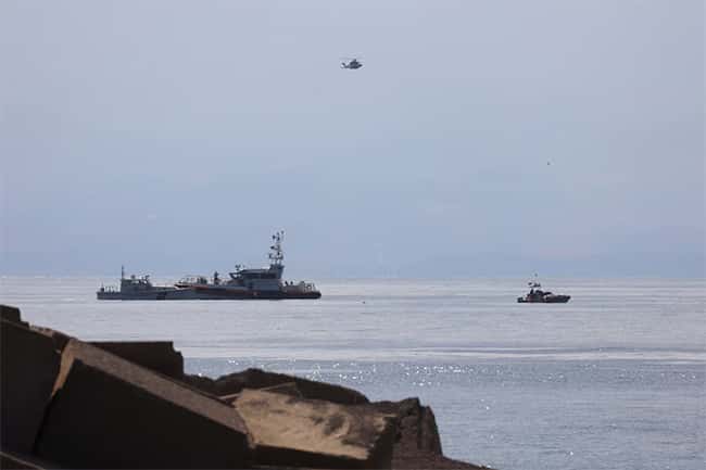 One dead, six missing after luxury yacht sinks off Sicily