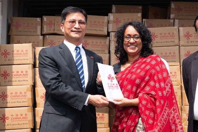 Sri Lanka receives China’s fabric grant for 2025 school uniforms