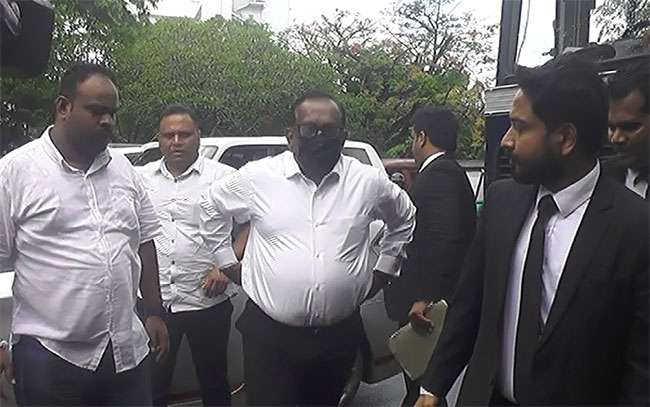 Ex-Minister Mahindananda Aluthgamage appears in court