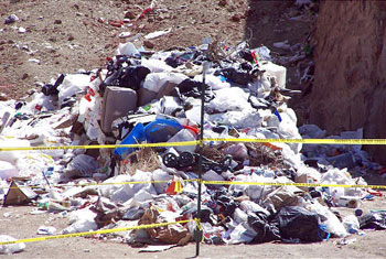 Infant’s body found among trash 