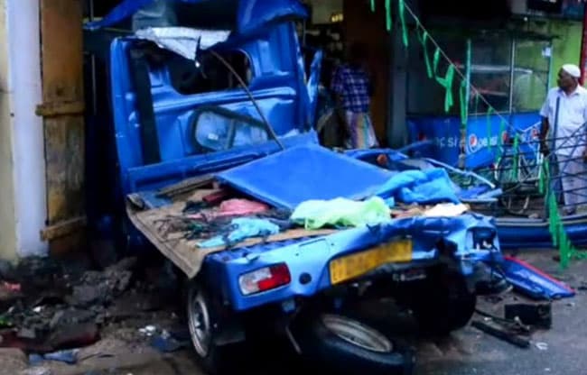 CCTV: One injured after parked lorry crashes into shop