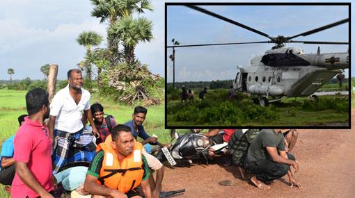SLAF helicopter rescues 6 people trapped after dam breaks