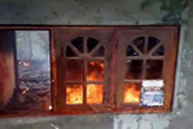 Man stabs wife, sets himself on fire