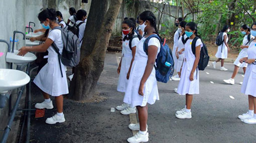 Schools reopen for three grades