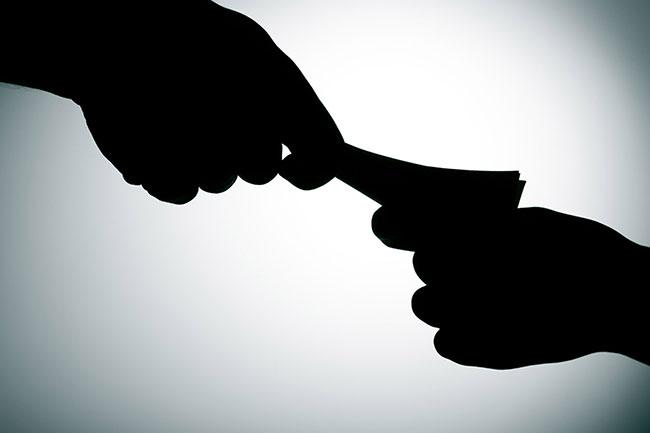 Principal of leading school arrested on bribery charge