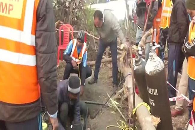 Race against time to save boy, eight, stuck down a 400ft well for 16 hours