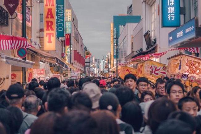 Japan’s population falls while foreign residents rise to record