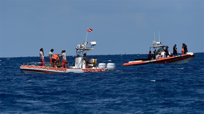 Divers recover 5 bodies from wrecked superyacht off Sicily; 1 still missing