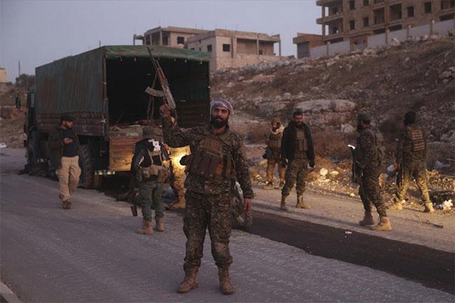 In a shock offensive, insurgents breach Syria’s largest city for the first time since 2016 