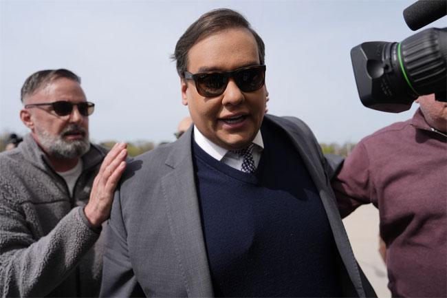 Ex-US Rep. George Santos sentenced to over 7 years in prison for fraud and identity theft