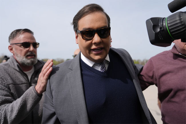 Ex-US Rep. George Santos sentenced to over 7 years in prison for fraud and identity theft