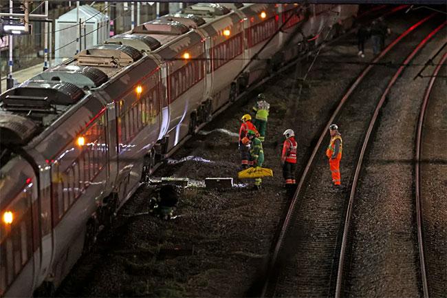 UK police say 10 people hospitalized after train stabbing attack, 9 with life-threatening injuries