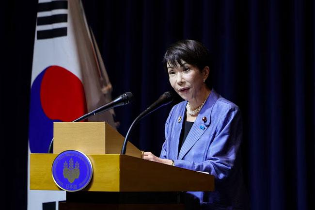 China warns Japan of ‘crushing’ defeat, tells Chinese citizens to shun visits
