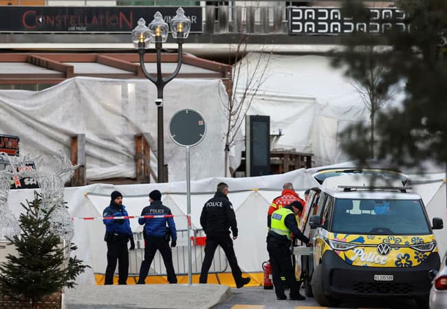 Swiss face painful task of identifying victims of deadly bar fire