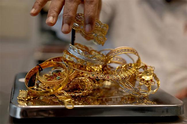 Gold vaults past $5,200 to record high