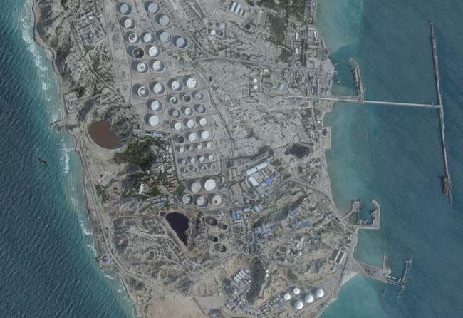 Iran warns of strikes on regional US-linked oil firms after American attack on crucial oil export hub