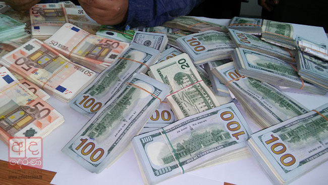 Woman held with foreign currency worth over Rs 28m