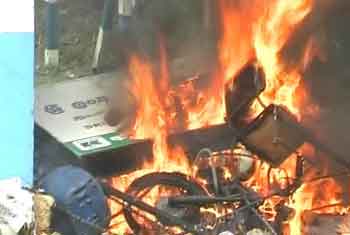 VIDEO: Residents set fire to Police property in Dompe