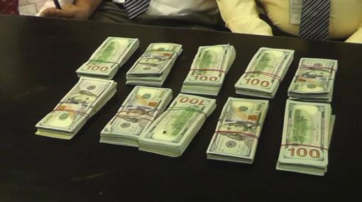 Sri Lankan female nabbed with USD 100,000