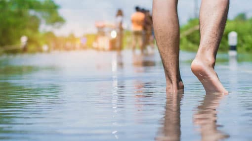 Person missing after being swept away by floods