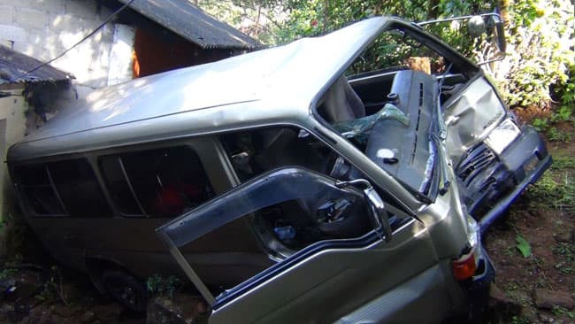 Five injured in head-on collision between van and bus