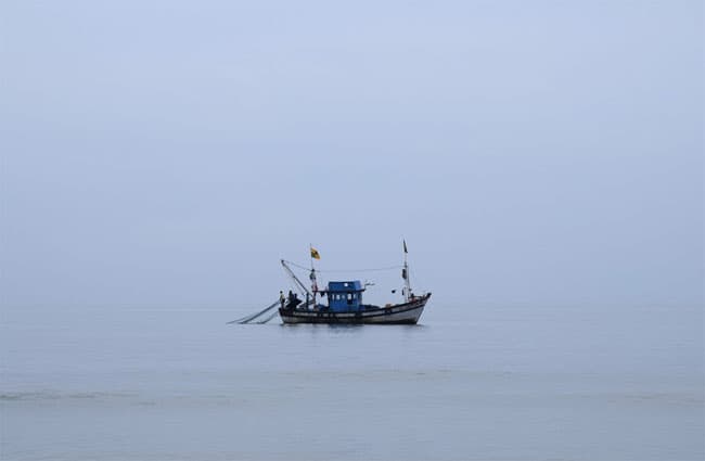 Four fishermen die after drinking from bottle found in sea; 2 survivors taken aboard merchant vessel