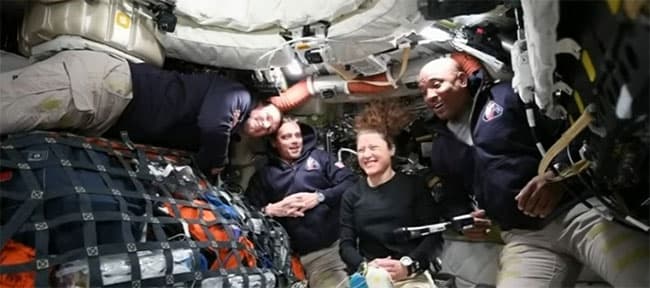 Artemis capsule boost puts astronauts moon-bound for record-breaking journey