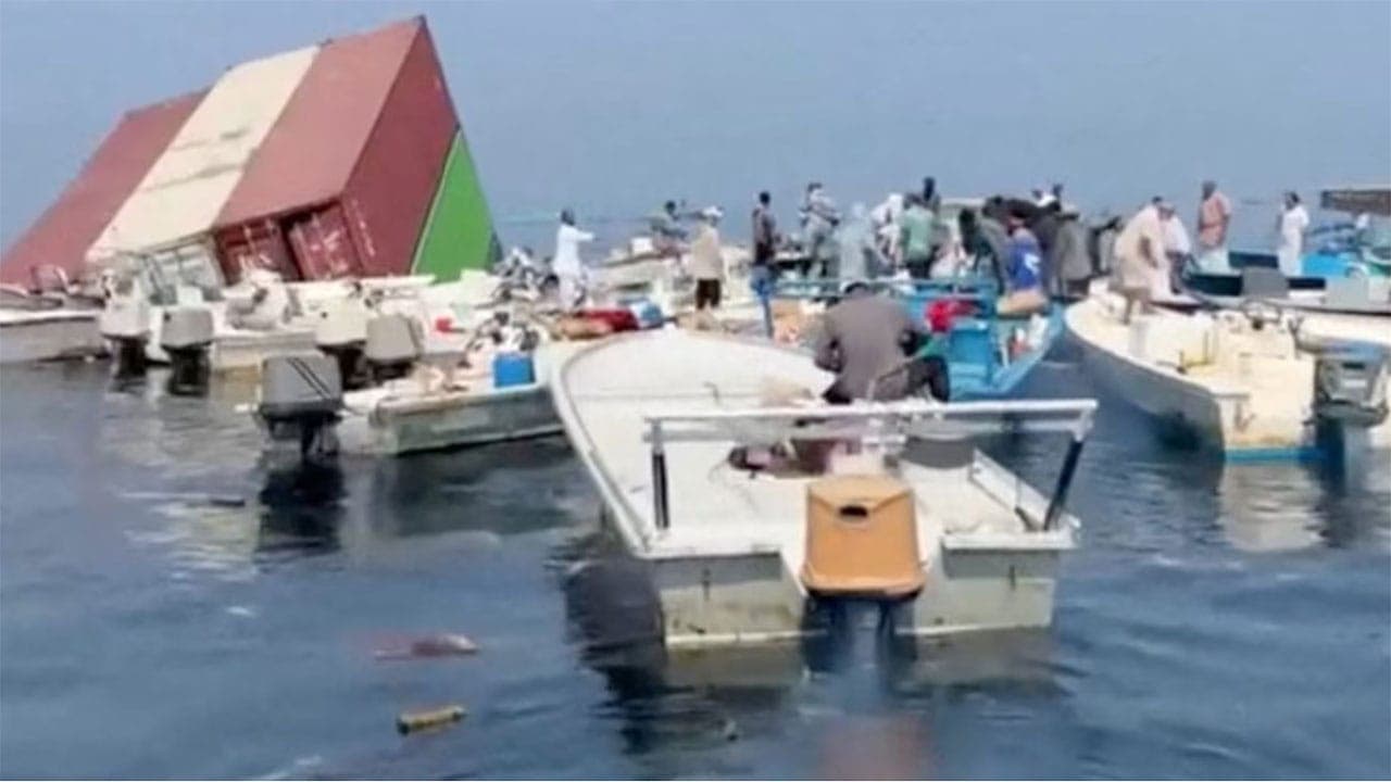 Two ships sink near Hormuz after being hit by projectiles amid surge in attacks