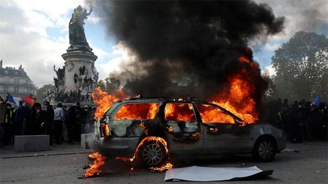Violent clashes, looting and buildings ablaze in France as over 1,000 arrested after protests