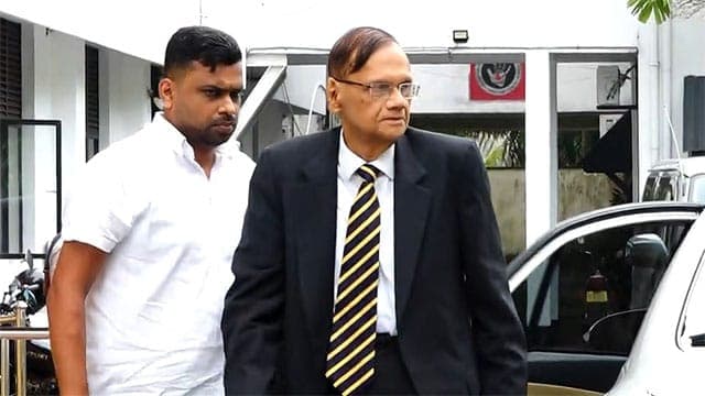 Ex-Minister G.L. Peiris arrives at Bribery Commission
