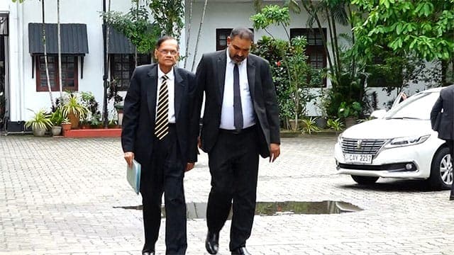 Ex-Minister G.L. Peiris leaves Bribery Comm. after recording statement