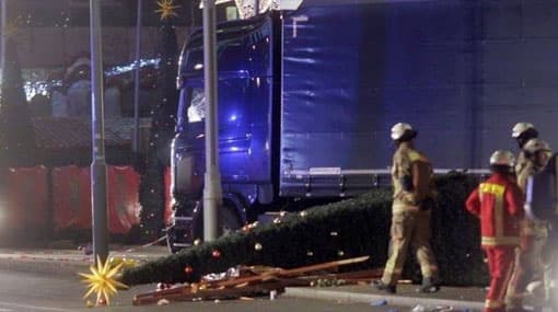 Truck plows into crowd at Berlin Christmas market, 12 dead
