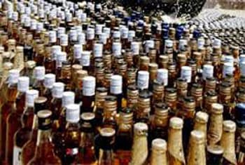 Youth held following raid on illicit liquor racket