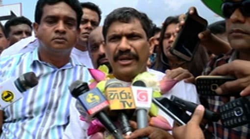 Duleep Wijesekara sits in Opposition; PM takes a jibe