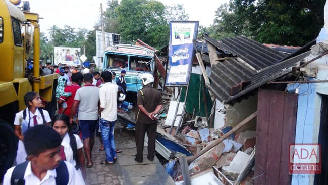 Lorry crashes into five shops after driver falls asleep