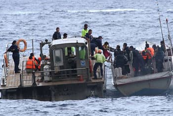 Bad weather keeps asylum boats in port