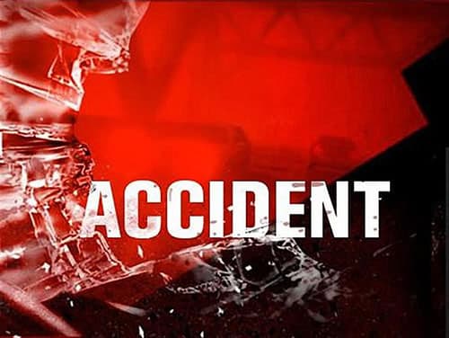 One dead in van-motorcycle collision; monks among injured