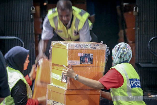 Malaysian police seize designer bags, cash, jewels, gold from Najib-linked condos