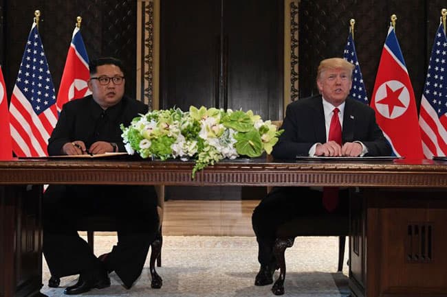 Trump and Kim sign agreement following historic meeting in Singapore