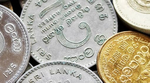 IMF urges Sri Lanka to let Rupee slide