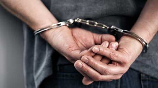 Person arrested with heroin and a live hand grenade