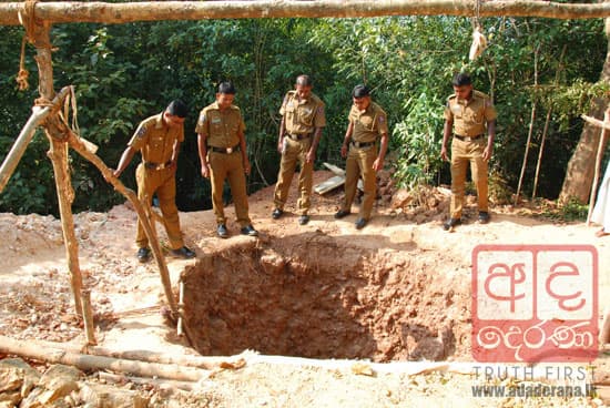 Two nabbed digging for treasure near temple in Puttalam