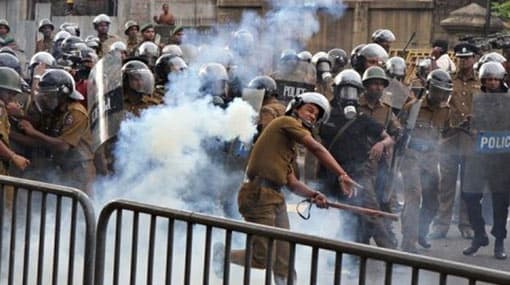 Tear gas and water cannons fired at protestors