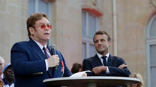 Elton John gets top French award, joins AIDS fight call