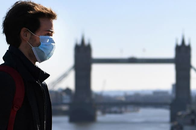 Global Covid-19 deaths sweep past 16,500; UK goes into three-week lockdown