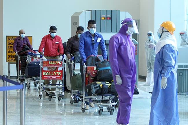 164 Sri Lankans in Bangalore return home in special flight